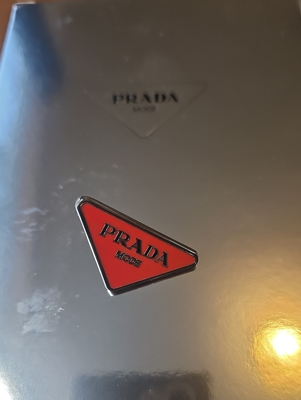 Prada Red Triangle Logo Metal Pin Accessory